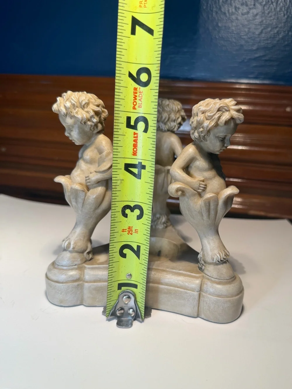 Vintage Resin Cherub Candle Holder features Three Cherubs Popping Out Of Flowers